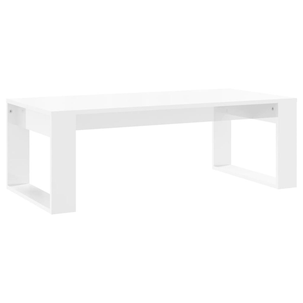 Vidaxl Konferenčný stolík lesklý biely 102x50x35 cm kompozitné drevo